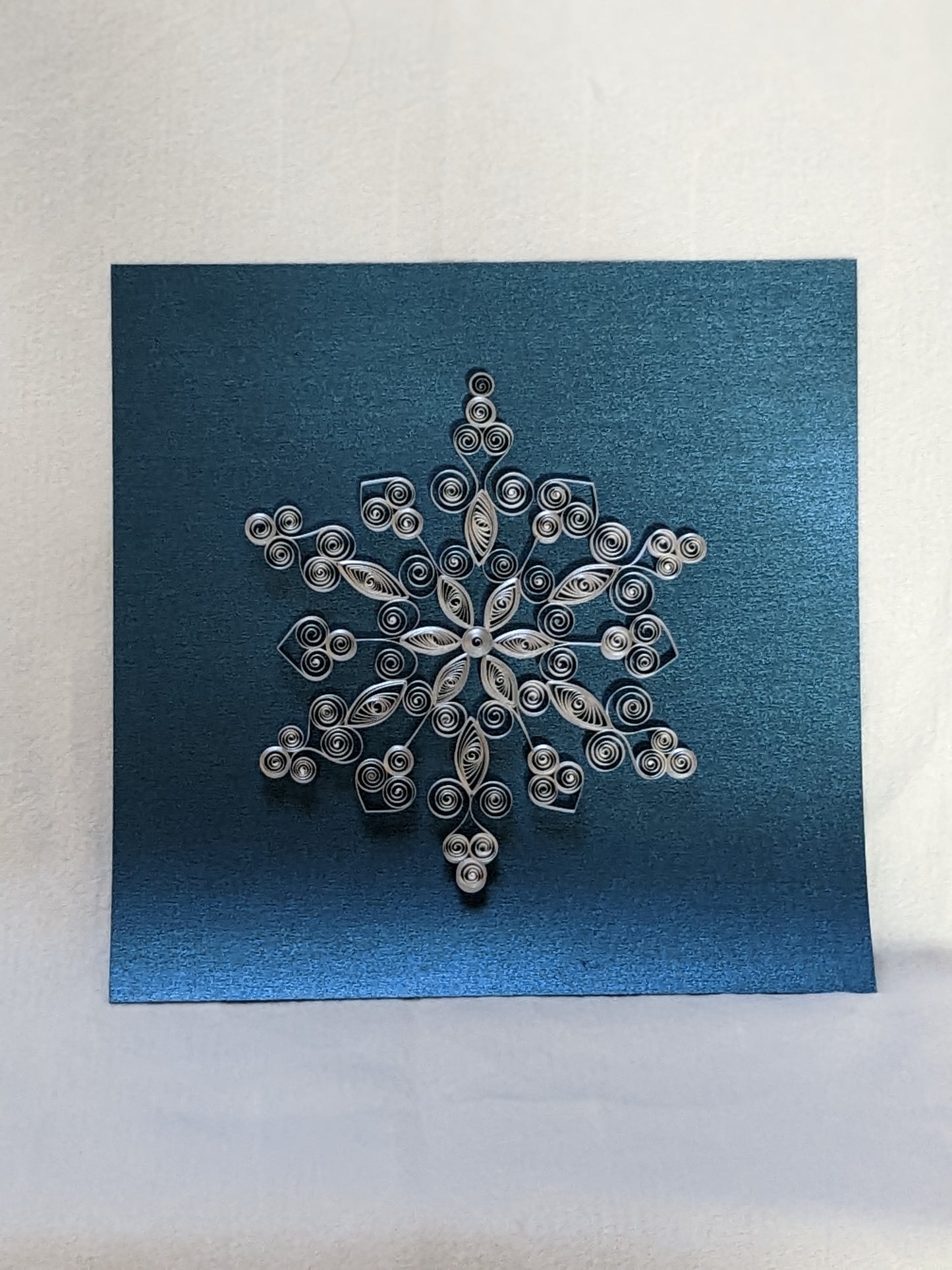 Silver Gilded Snowflake on Deep Blue